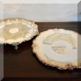 S41. Pair of round silverplate trays. One with claw and ball feet and the other without feet. Each 12.5”w - $30 